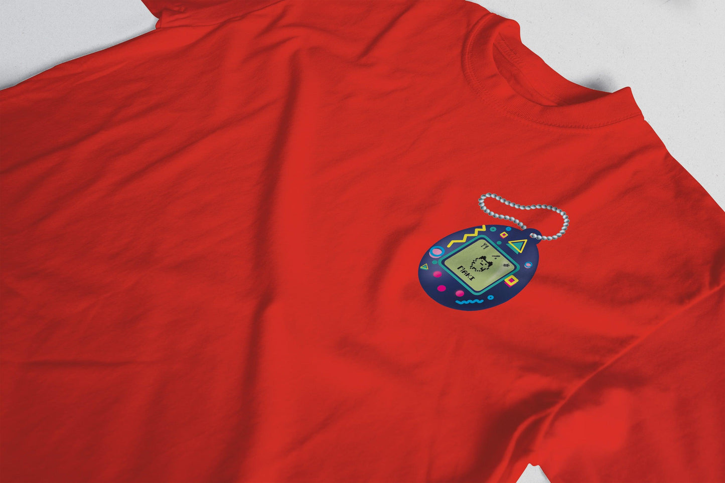 Tamagotchis POCKET T SHIRT